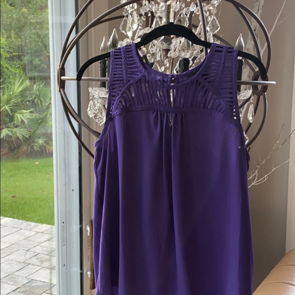 Purple sleeveless top with cut out detail